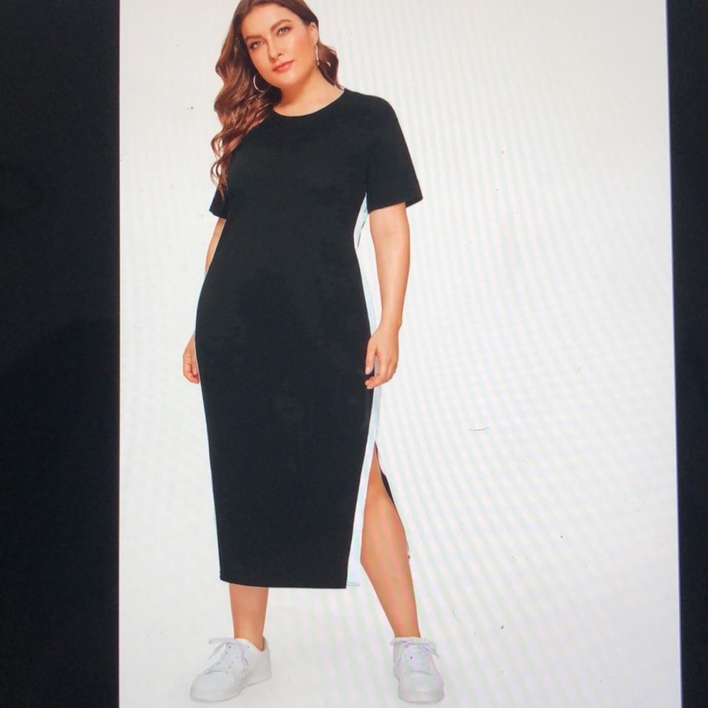 black tshirt dress with white stripes on side.